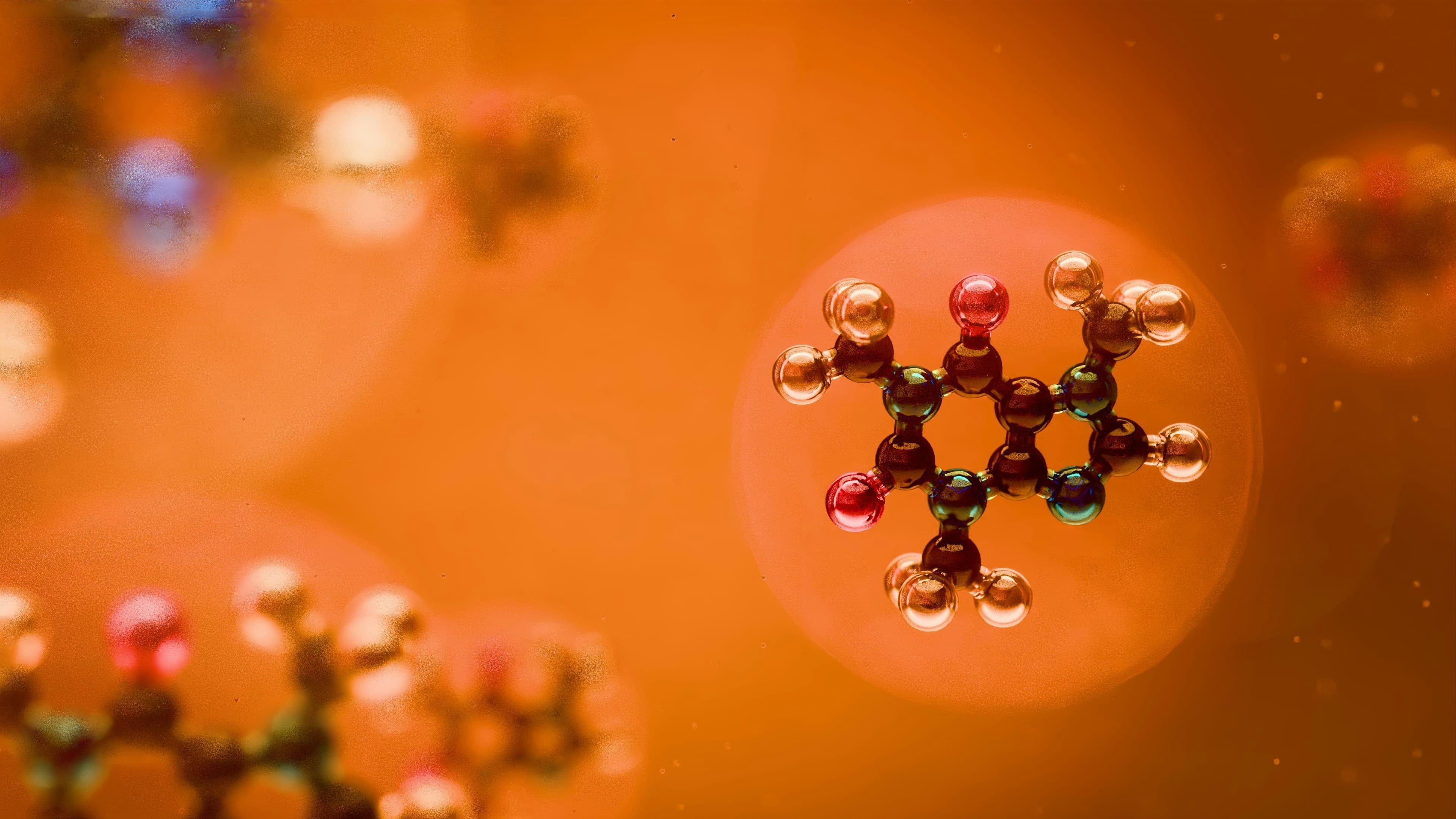 Molecular model showing ion exchange interaction in solution — charged molecules attracted to exchange sites on resin structure